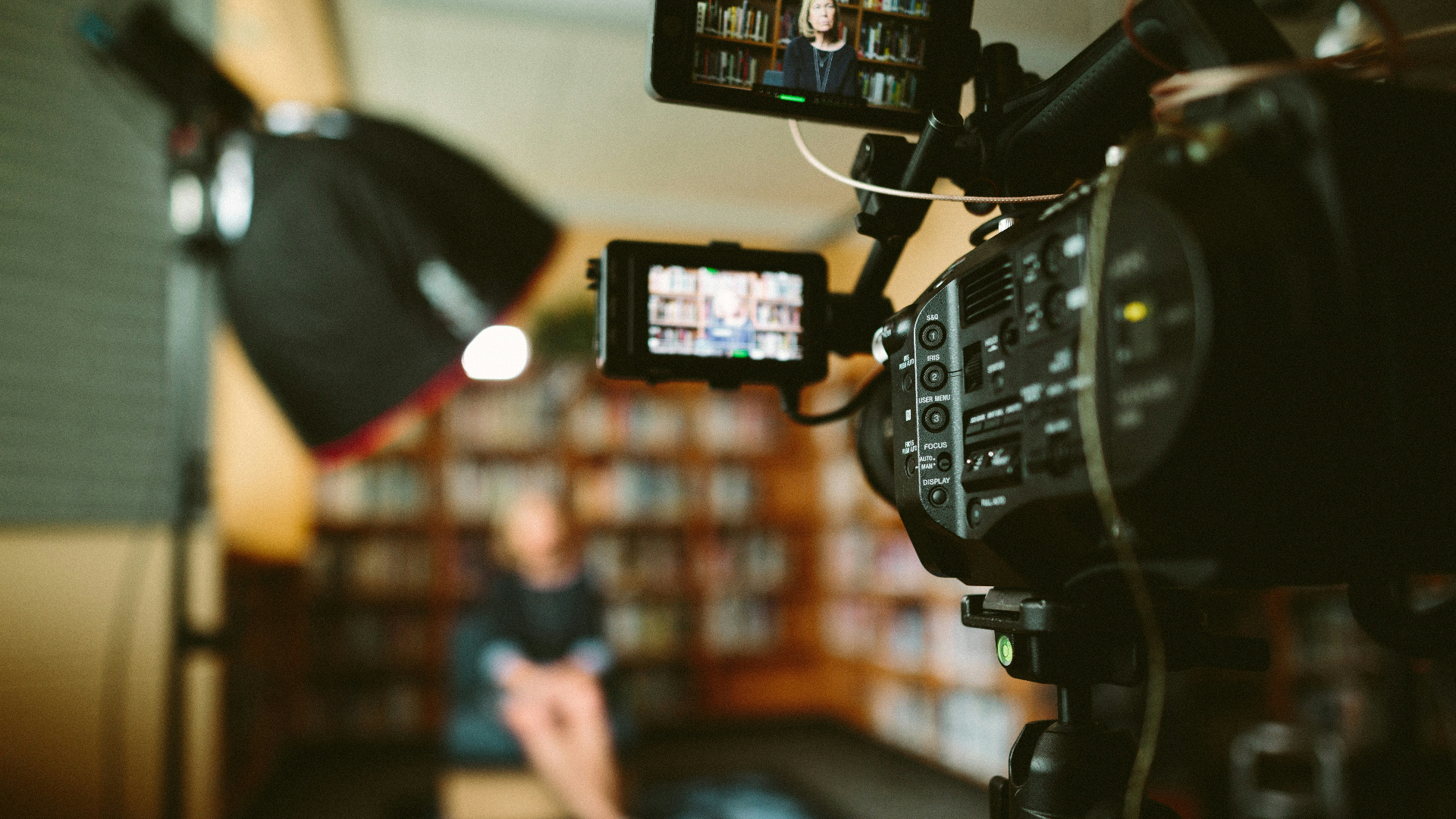 Professional cinema camera framing a founder